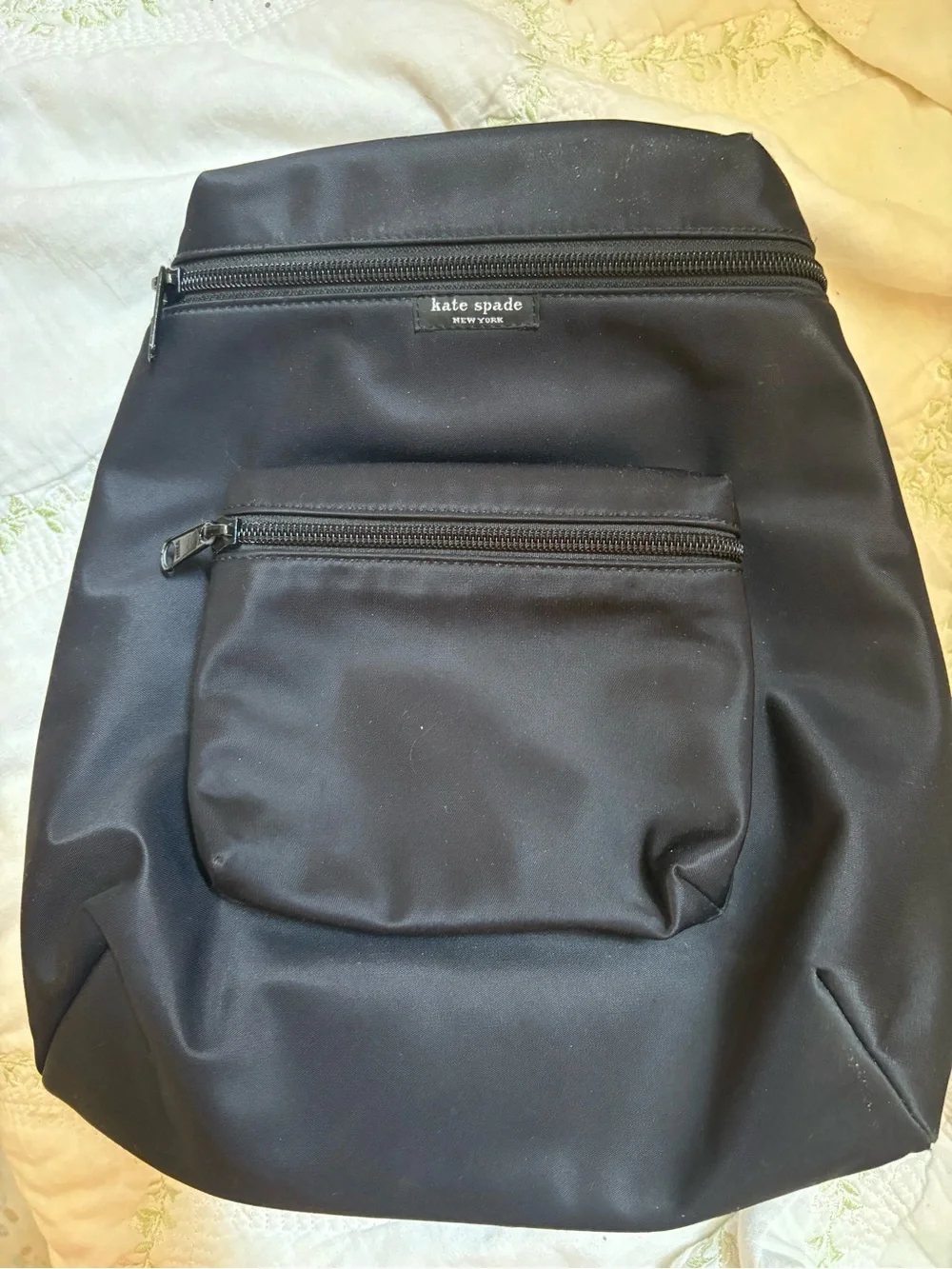 kate spade black nylon backpack with front zip pocket. Perfect condition!